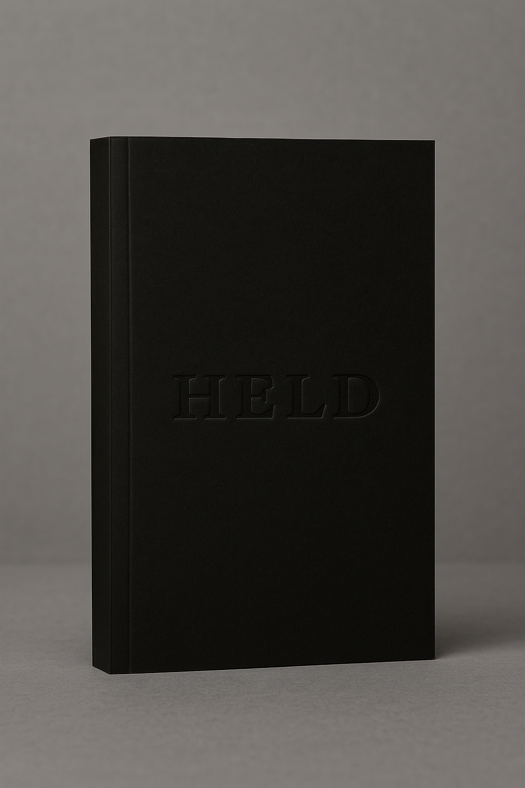 Cover of HELD by FEN – The Metaphysics of Dollmaking, a book on devotion and transformation